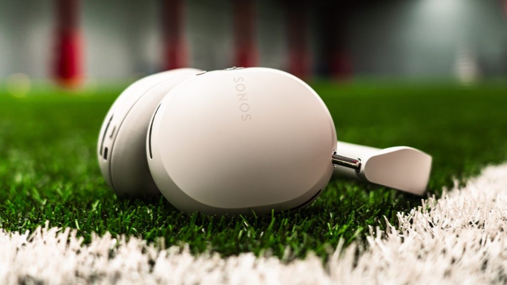 Sonos Ace headphones led on top of astroturf