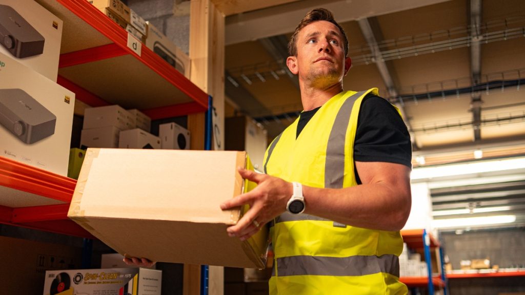 warehouse worker holding a parcel